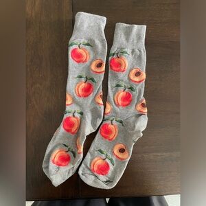 Grey dress socks with peaches on them
